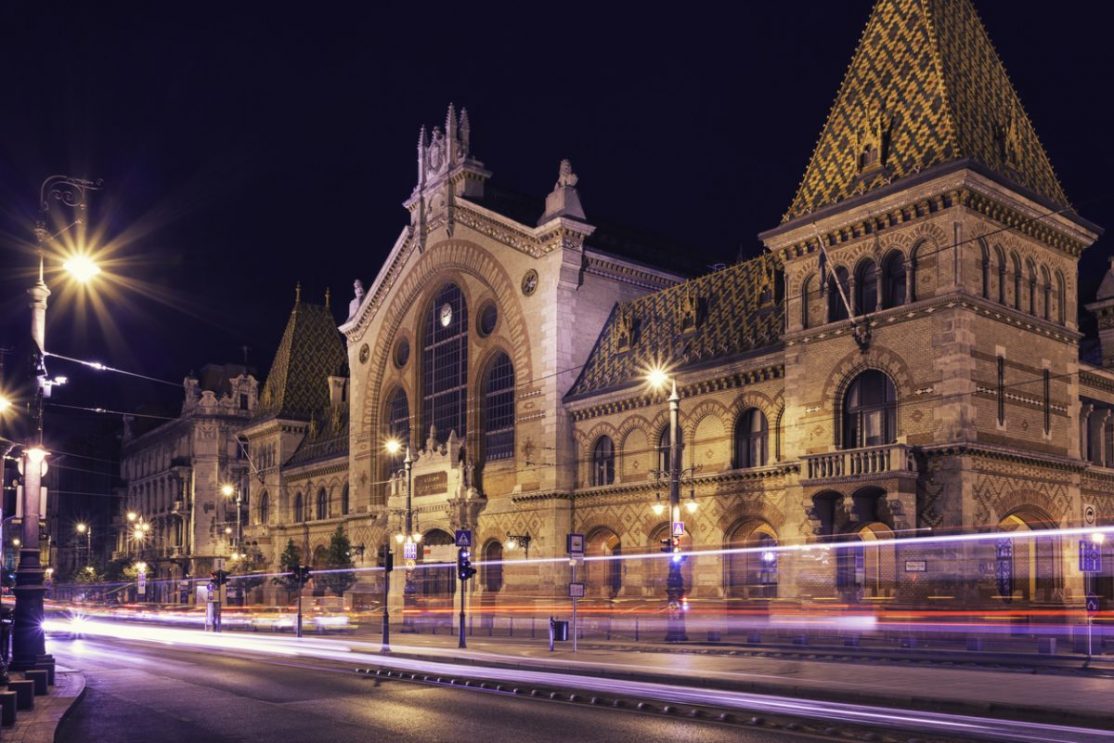 The Great Market Hall in Budapest at night.