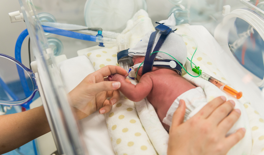 Premature baby in an incubator.
