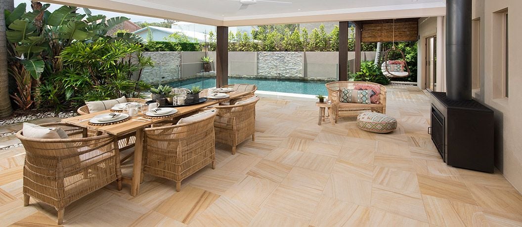 Outdoor dining area and swimming pool.