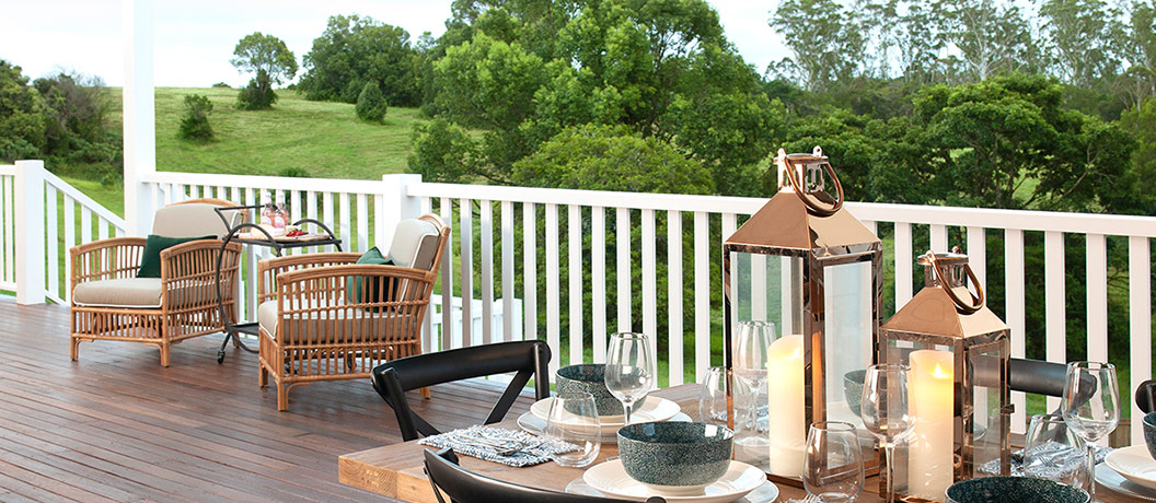 Deck with comfortable decor and accessories.