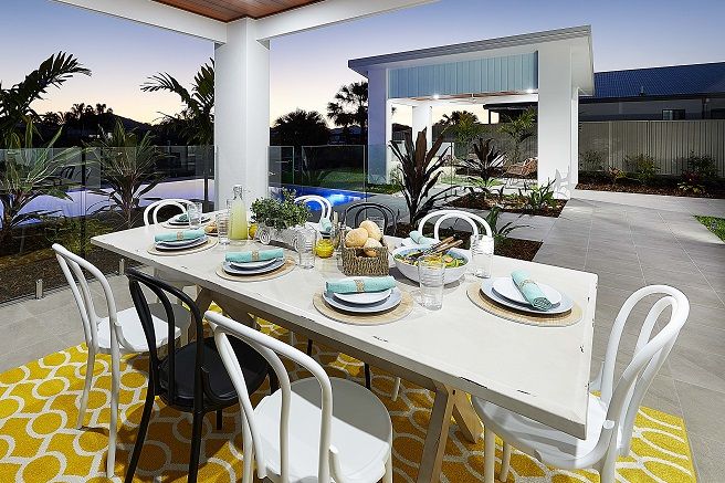 Outdoor dining table with pool view